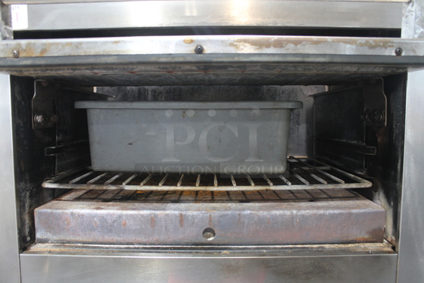 Garland M60XS Stainless Steel Commercial Floor Style Natural Gas Powered Vertical Upright Broiler.  - Image 3 of 9