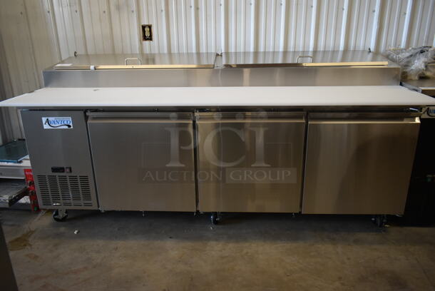 BRAND NEW SCRATCH AND DENT! 2023 Avantco 178SSPPT3 Stainless Steel Commercial Pizza Prep Table on Commercial Casters. 115 Volts, 1 Phase. Tested and Working! - Image 3 of 6
