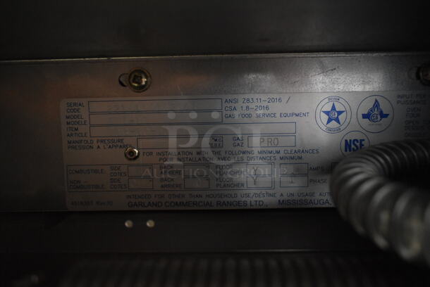 BRAND NEW SCRATCH AND DENT! 2022 Garland G36-6C Stainless Steel Commercial Propane Gas Powered 6 Burner Range w/ Convection Oven and Back Splash. - Image 11 of 12