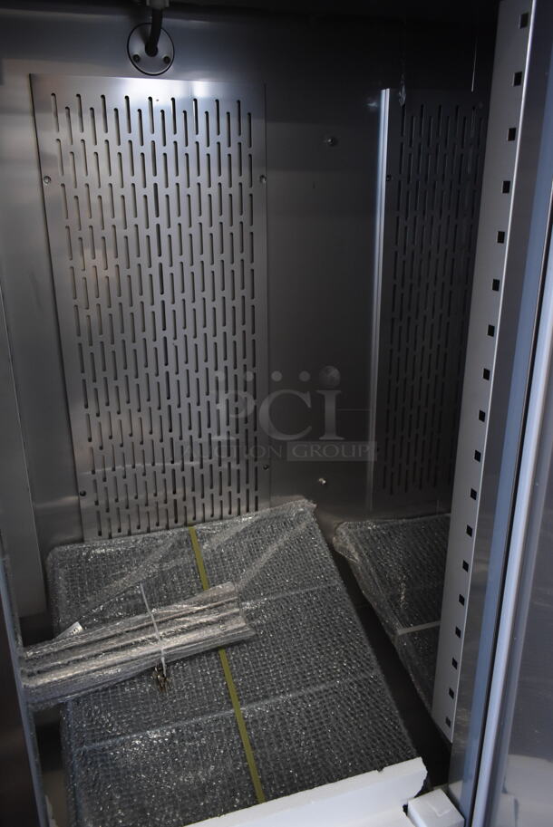 BRAND NEW SCRATCH AND DENT! 2023 Avantco 178SS3FHC Stainless Steel Commercial 3 Door Reach In Freezer on Commercial Casters. 115 Volts, 1 Phase. Tested and Working! - Image 5 of 7