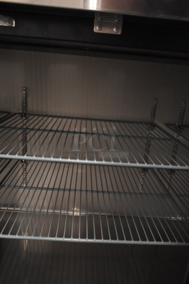BRAND NEW SCRATCH AND DENT! 2023 Avantco 178UBB4GHC Stainless Steel Commercial 3 Door Back Bar Cooler Merchandiser. 115 Volts, 1 Phase. Tested and Working! - Image 6 of 9
