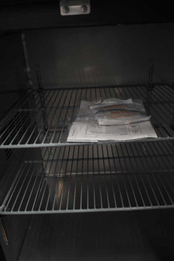 BRAND NEW SCRATCH AND DENT! 2023 Avantco 178UBB4GHC Stainless Steel Commercial 3 Door Back Bar Cooler Merchandiser. 115 Volts, 1 Phase. Tested and Working! - Image 7 of 9