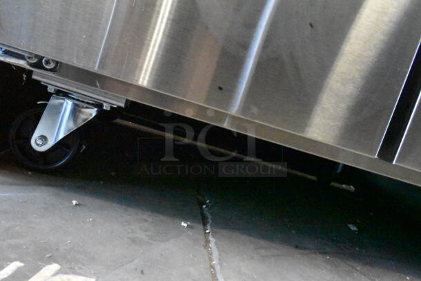 BRAND NEW SCRATCH AND DENT! 2023 Avantco 178SSWT36RHC Stainless Steel Commercial 2 Door Work Top Cooler on Commercial Casters. 115 Volts, 1 Phase. Tested and Working! - Image 4 of 8