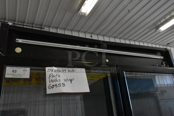 BRAND NEW SCRATCH AND DENT! 2023 Avantco 178GDC49HCB Metal Commercial 2 Door Reach In Cooler Merchandiser w/ Poly Coated Racks. See Pictures For Missing Top Panel. 115 Volts, 1 Phase. Tested and Working! - Image 2 of 4