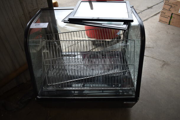 BRAND NEW SCRATCH AND DENT! Avantco 360BCC28HCB Metal 27 3/5" Black Refrigerated Countertop Bakery Display Case with LED Lighting. See Pictures for Shattered Side Glass Panes. 120 Volts, 1 Phase. Tested and Working! - Image 2 of 5
