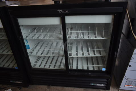 2024 True GDM-41SL-48-HC-LD Metal Commercial 2 Door Reach In Cooler Merchandiser w/ Poly Coated Racks. 115 Volts, 1 Phase. Tested and Working!