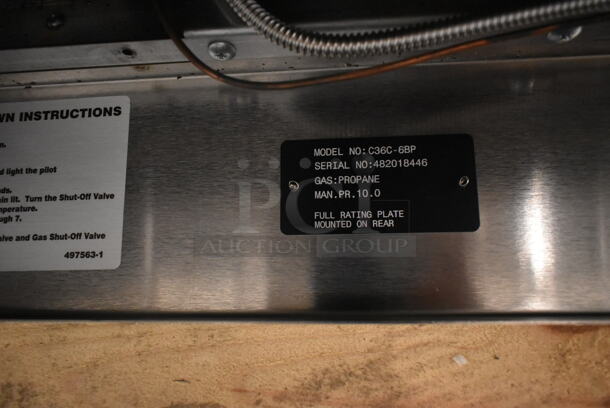 BRAND NEW SCRATCH AND DENT! Wolf Stainless Steel Commercial Propane Gas Powered 6 Burner Range w/ Convection Oven, Over Shelf and Back Splash. - Image 6 of 6