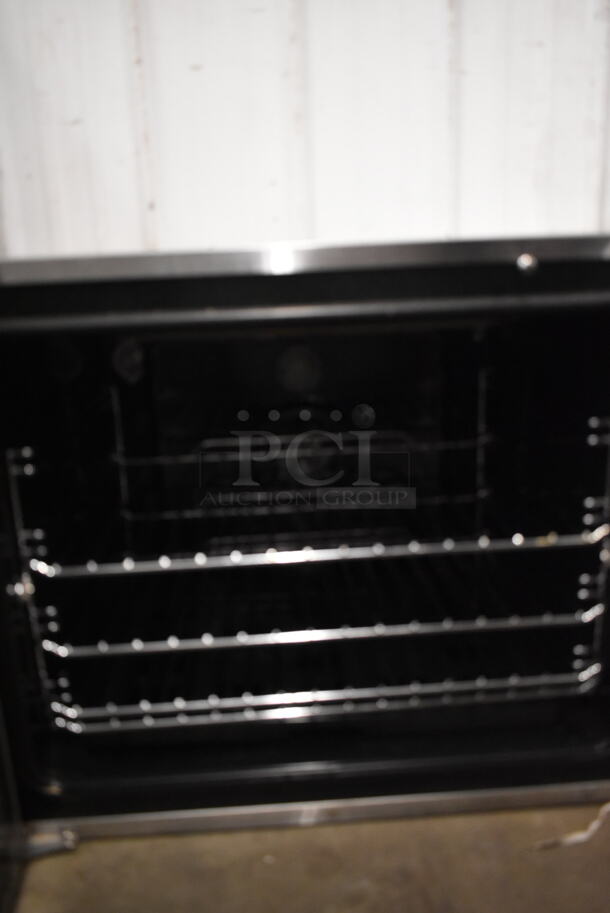 Moffat Turbofan E31D4 Stainless Steel Commercial Electric Powered Convection Oven w/ Metal Oven Racks. 208 Volts.  - Image 2 of 3