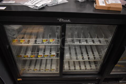 2017 True GDM-41SL-48-HC-LD Metal Commercial 2 Door Reach In Cooler Merchandiser w/ Poly Coated Racks. 115 Volts, 1 Phase. Tested and Working!