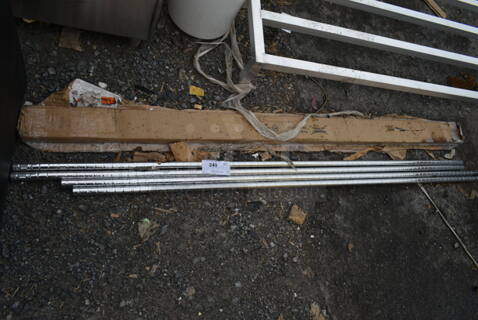 BRAND NEW SCRATCH AND DENT! 4 Chrome Finish Poles. 74"