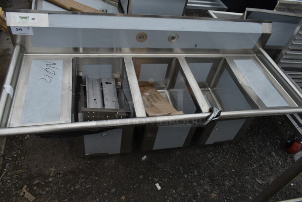 BRAND NEW SCRATCH AND DENT! Regency 600S31220212 64" 16-Gauge Stainless Steel Three Compartment Commercial Sink with Galvanized Steel Legs and 2 Drainboards - 12" x 20" x 12" Bowls - Image 2 of 4