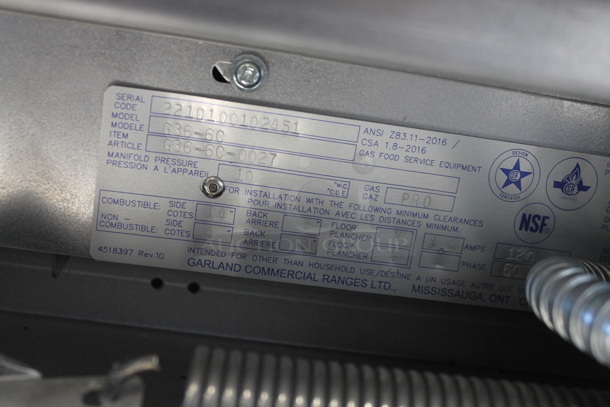 BRAND NEW SCRATCH AND DENT! 2022 Garland G36-6C Stainless Steel Commercial Propane Gas Powered 6 Burner Range w/ Oven, Over Shelf and Back Splash.  - Image 5 of 5
