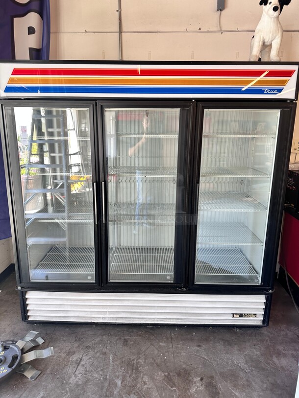 True GDM-72F 78 inch Three Section Display Freezer w/ Swing Doors - Bottom Mount Compressor, Black, 115/208v Working - Image 1 of 6