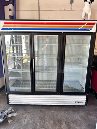 True GDM-72F 78 inch Three Section Display Freezer w/ Swing Doors - Bottom Mount Compressor, Black, 115/208v Working