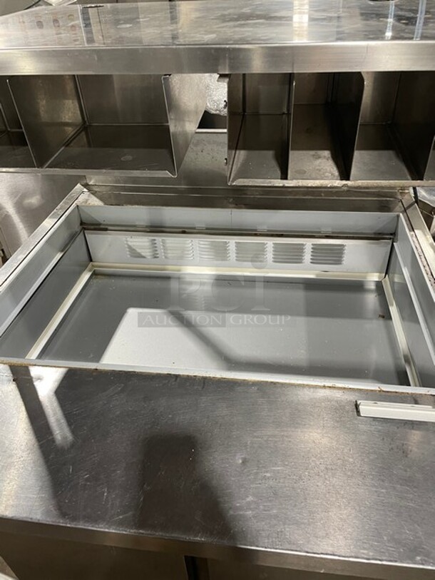 Beverage Air Stainless Steel Salad/Pizza Prep Table! With Over Head Shelf Build In Cubbies For Utensils! With 2 Door Underneath Storage Space!  On Casters! MODEL SPE36HC-15M SN: 12204295 115V 1PH - Image 7 of 11