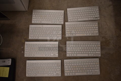 8 Apple A1314 White Keyboards. 8 Times Your Bid! (front room)