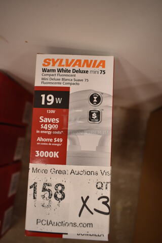 Lot of 3 Sylvania Warm White Deluxe mini 75 Light Bulbs. (front room)