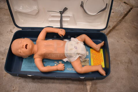 Resusi-Baby 80 CPR Training Dummy in Hard Case. (front room)
