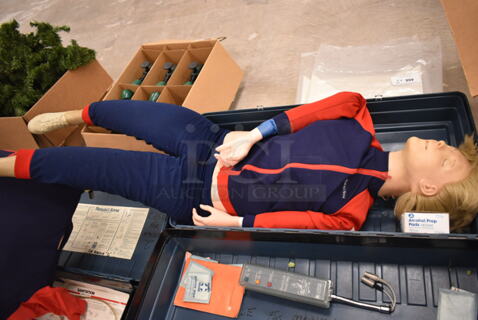 2 Resusi Anne CPR Training Dummy in Hard Cases; 1 Torso and 1 Full Body. 2 Times Your Bid! (front room)