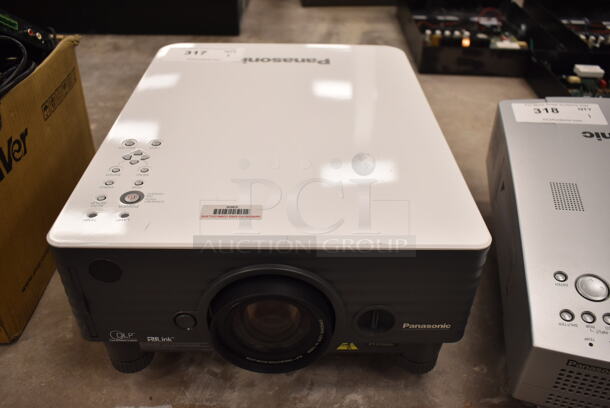 Panasonic PT-D3500U DLP Projector. 120 Volts, 1 Phase. (front room) - Image 1 of 6