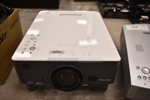 Panasonic PT-D3500U DLP Projector. 120 Volts, 1 Phase. (front room)