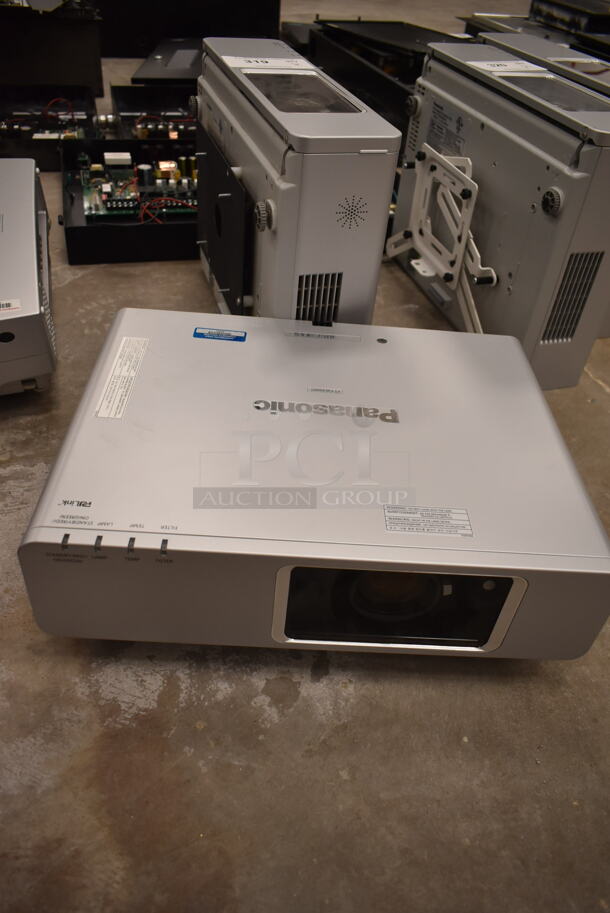 2 Panasonic TQFE683AA Projector. 2 Times Your Bid! (front room) - Image 1 of 5