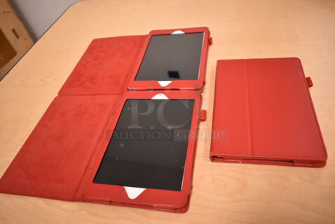 3 Apple A1432 7.9" iPad w/ Red Case. 3 Times Your Bid! (front room)
