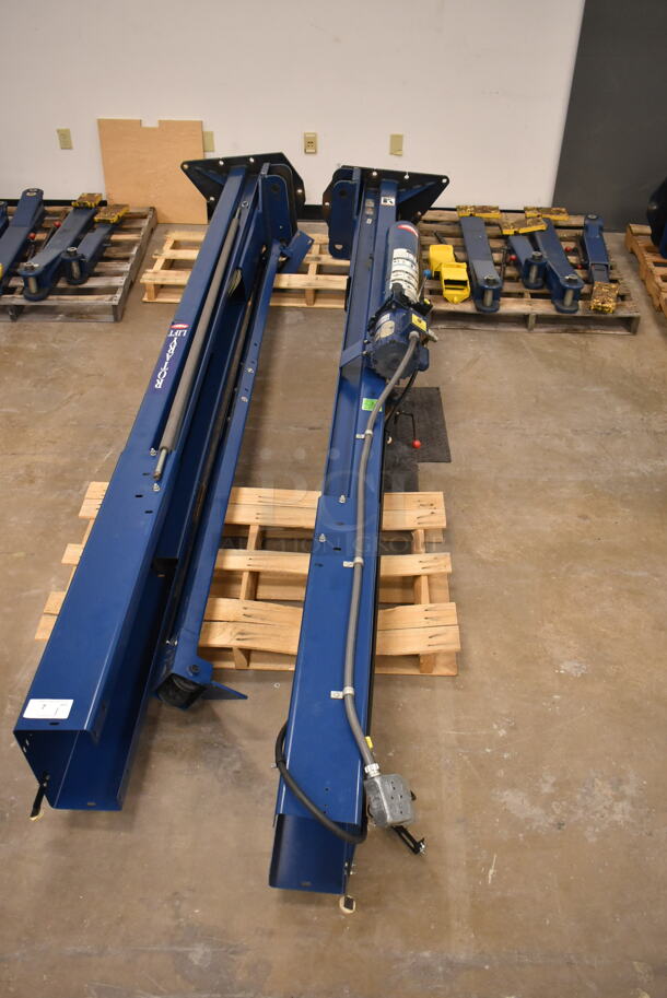 Rotary SPOA88 Metal 7,000 Pound Capacity Lift w/ Extra Parts. 208-230 Volts, 1 Phase. BUYER MUST REMOVE: Bring Tools and Manpower Needed To Remove This Item. (front room) - Image 1 of 12