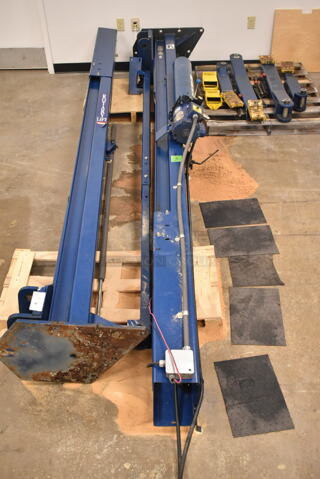 Rotary SPOA88 Metal 7,000 Pound Capacity Lift w/ Extra Parts. 208-230 Volts, 1 Phase. BUYER MUST REMOVE: Bring Tools and Manpower Needed To Remove This Item. (front room)