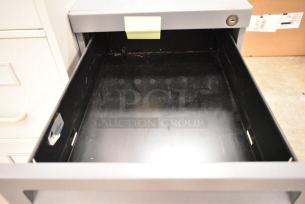 2 Metal Filing Cabinets; 4 Drawer and 3 Drawer. 2 Times Your Bid! 15x26.5x26, 15x22x27. (back room) - Image 3 of 10