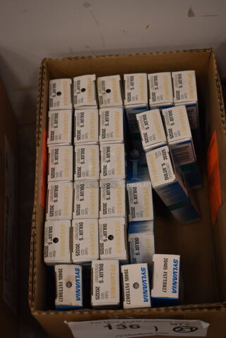 Box of 27 Various Sylvania Light Bulb Including Dulux S 20325. (front room)