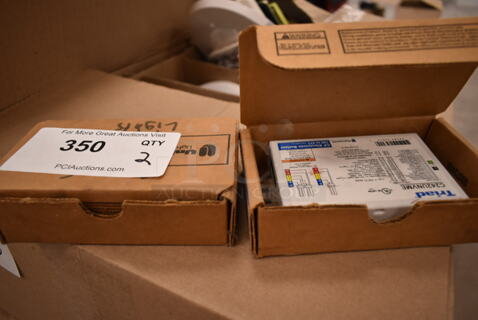 2 Triad C242UNVME Electronic Ballast. 2 Times Your Bid! (front room)