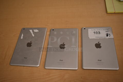 3 Apple A1432 7.9" iPad. 3 Times Your Bid! (front room)