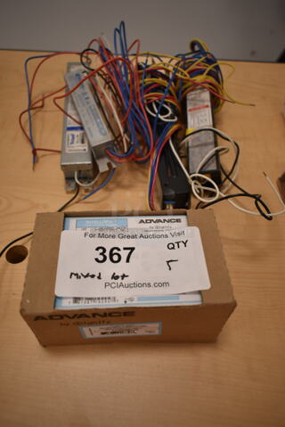Lot of 5 Various Items Including 4 Ballasts and 1 Advance IntelliVolt. (front room)