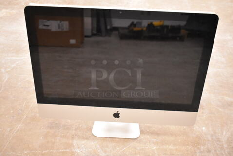 Apple A1311 21.5" iMac Desktop All In One Computer. 100-240 Volts, 1 Phase. (front room)