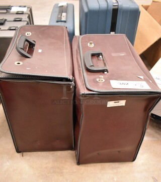 2 Brown Cases w/ Contents Including Various Lenses, Panasonic Video AC Adapter and Panasonic PV-L454D Recorder. 2 Times Your Bid! (front room)