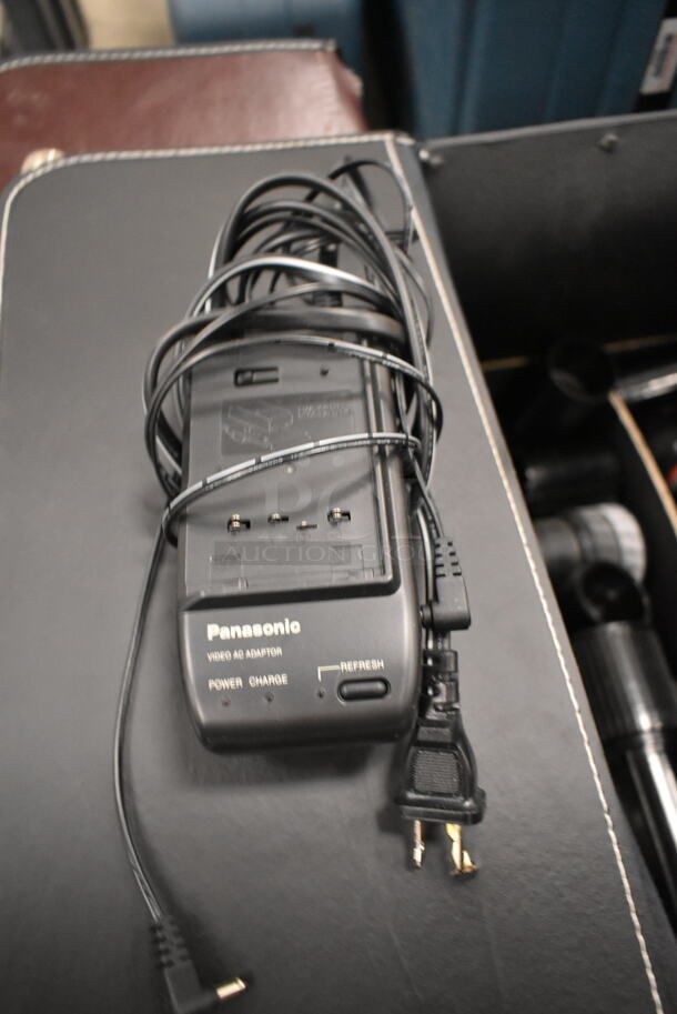 2 Brown Cases w/ Contents Including Various Lenses, Panasonic Video AC Adapter and Panasonic PV-L454D Recorder. 2 Times Your Bid! (front room) - Image 7 of 10