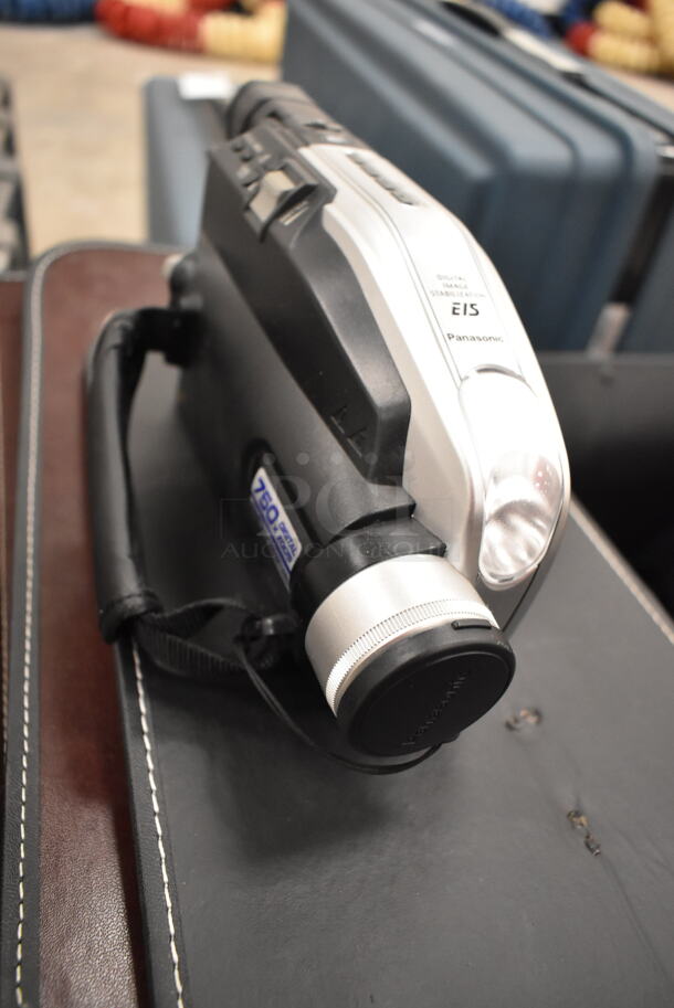 2 Brown Cases w/ Contents Including Various Lenses, Panasonic Video AC Adapter and Panasonic PV-L454D Recorder. 2 Times Your Bid! (front room) - Image 8 of 10