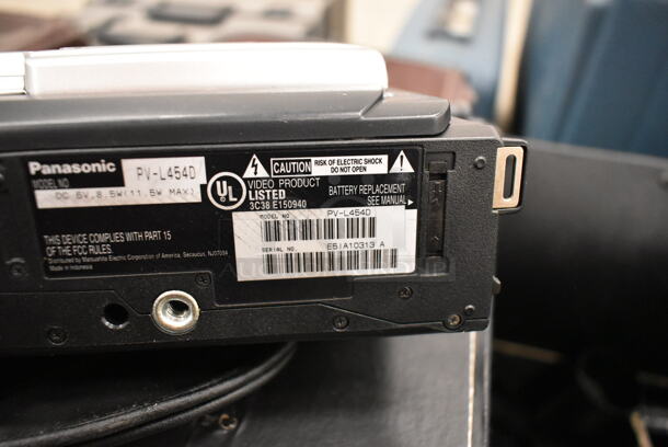 2 Brown Cases w/ Contents Including Various Lenses, Panasonic Video AC Adapter and Panasonic PV-L454D Recorder. 2 Times Your Bid! (front room) - Image 10 of 10
