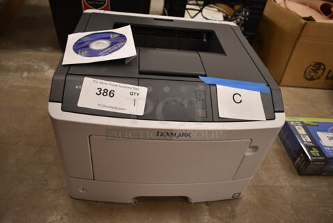 Lexmark MS310d Countertop Printer. (front room)