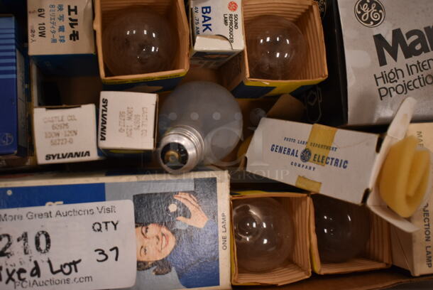 Box of 37 Various Bulbs Including GE Marc Projection Lamp, Sylvania 2500/CL/DC. (front room) - Image 5 of 6