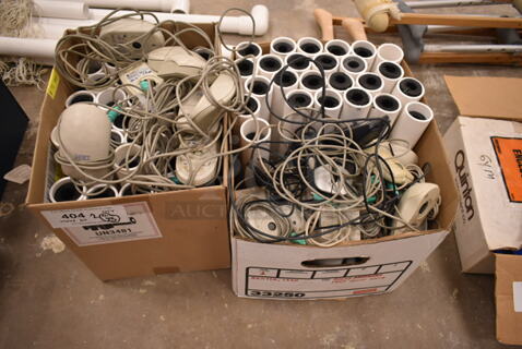 ALL ONE MONEY! Lot of 2 Boxes of Various Items Including Computer Mouses and PVC Pipes. (front room)