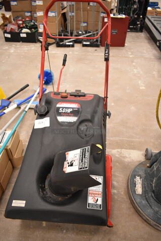 Troy Bilt 31AE285-063 Metal Snow  Thrower. (front room)