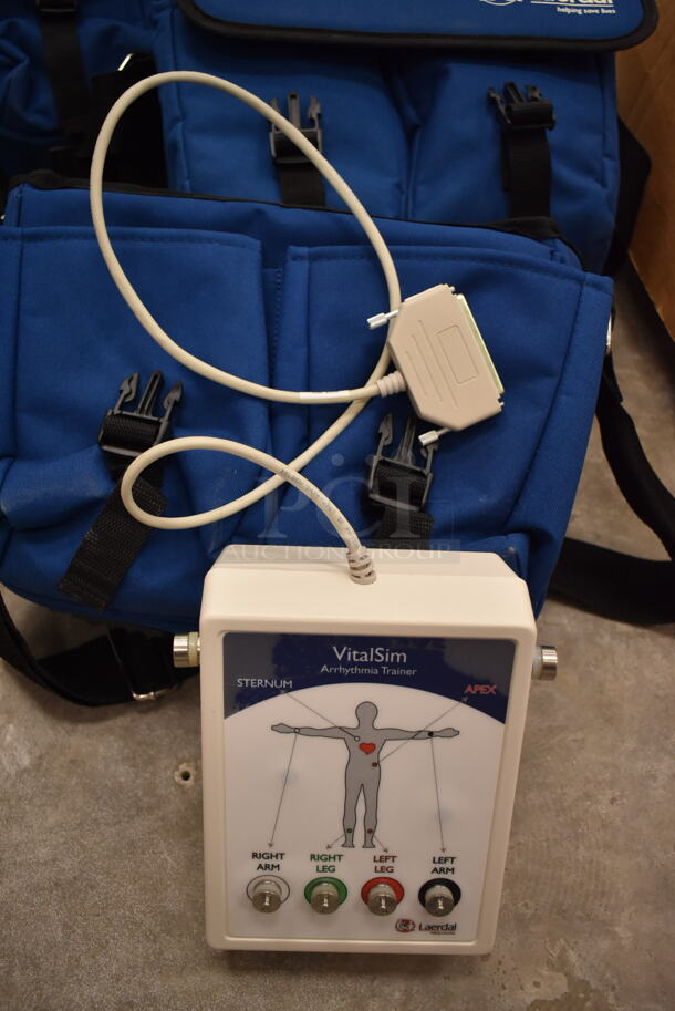 3 VitalSlim Items; 1 Arrhythmia Trainer and 2 VitalSlim Vital Signs Simulator in 3 Laerdal Blue Bags. 3 Times Your Bid! (front room) - Image 2 of 10