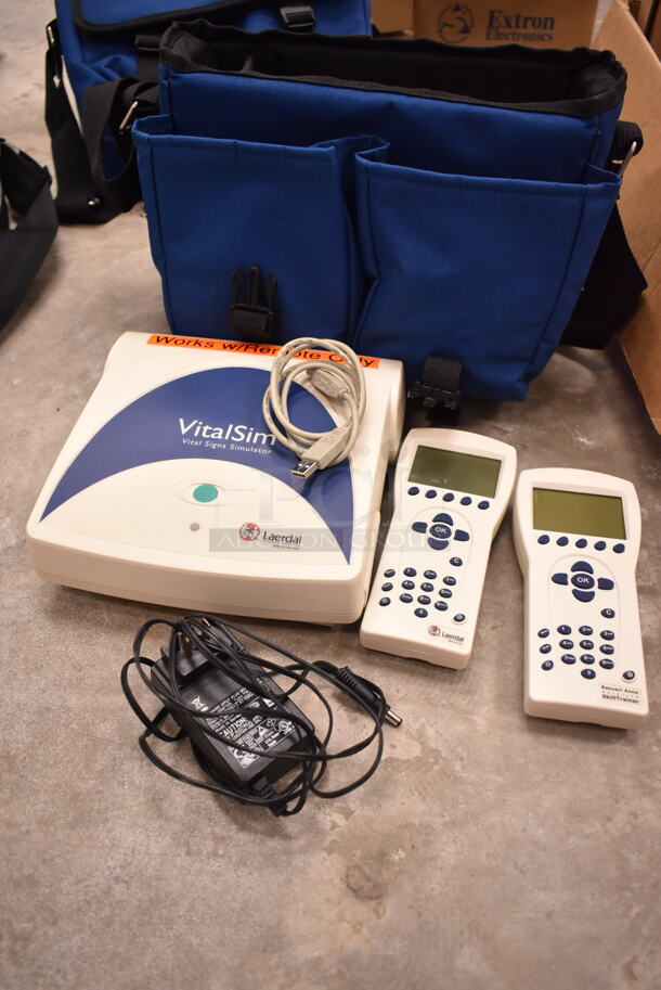 3 VitalSlim Items; 1 Arrhythmia Trainer and 2 VitalSlim Vital Signs Simulator in 3 Laerdal Blue Bags. 3 Times Your Bid! (front room) - Image 4 of 10