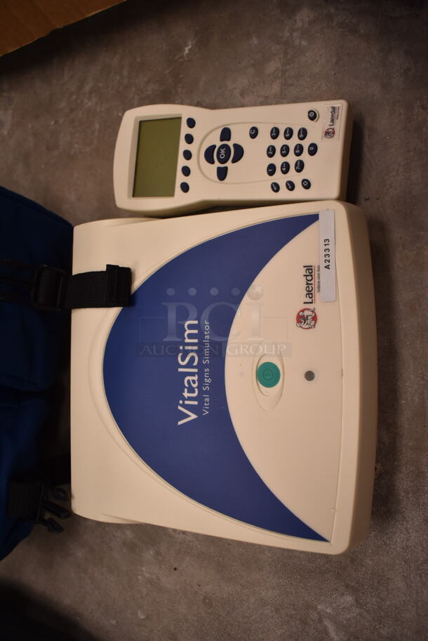 3 VitalSlim Items; 1 Arrhythmia Trainer and 2 VitalSlim Vital Signs Simulator in 3 Laerdal Blue Bags. 3 Times Your Bid! (front room) - Image 9 of 10