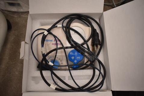 Cavitron 300 Series Plus Ultrasoinc Scaling System. (front room)