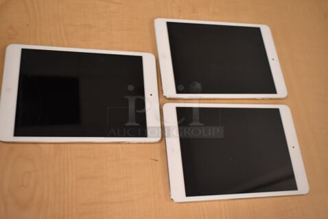 3 Apple A1432 iPads. 3 Times Your Bid! (front room)