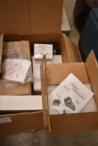 ALL ONE MONEY! Lot of Various Items Including 302 Battery Charger, enFlow AC Power Supply. (front room)