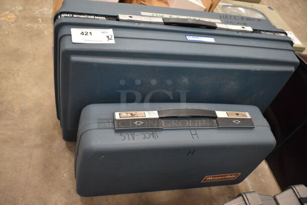 2 Hard Blue Cases w/ 1 CPR Training Resusci-Baby Dummy. 2 Times Your Bid! (front room) - Image 1 of 5